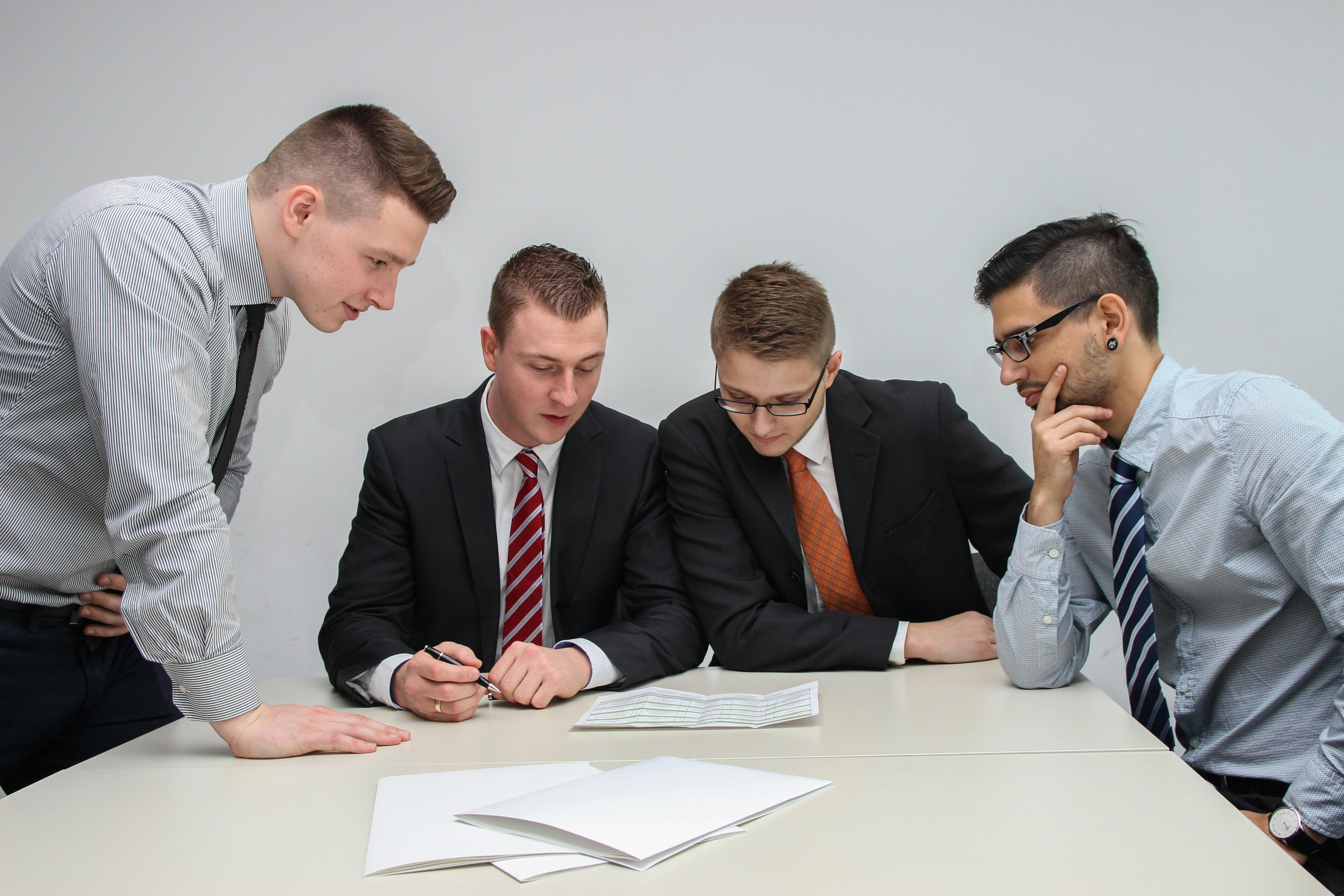 Startup team discussing fundraising strategy